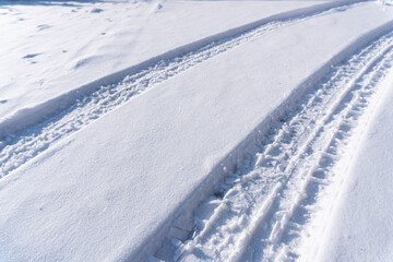 Naklejka premium car tire tracks on the snow