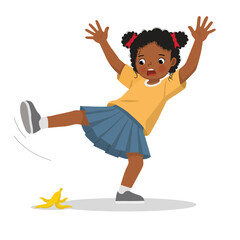 Little African girl falling down slip on banana peel  © Tenstudio