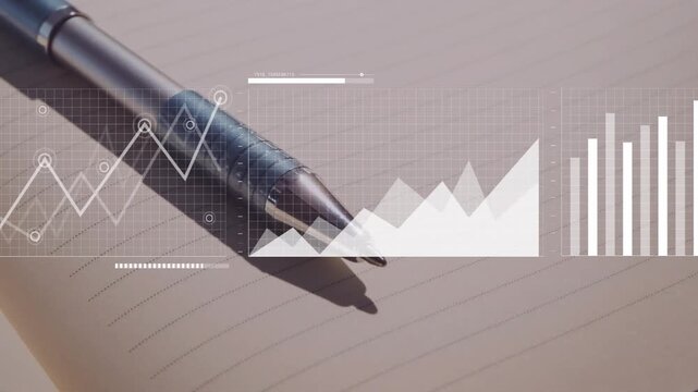 Metallic pen resting on lined notebook page, showing transparent data grid with area and bar charts