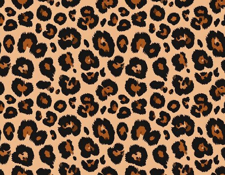 A seamless, repetitive pattern featuring dark brown and black irregular spots set on a light tan background, simulating animal hide