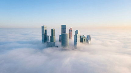 City Skyline Above Clouds at Sunrise: Skyscrapers emerging from fog under a golden sky, symbolizing ambition, growth, and futuristic urban development.