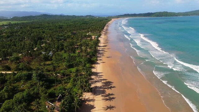 Aerial drone shot of San Vicente Long Beach, capturing  stretch of pristine sand and turquoise waters in Palawan, tropical paradise in Philippines, travel destination 