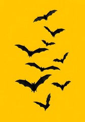 Flock of bats against yellow sky