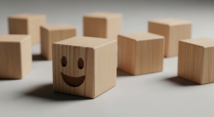 Obraz premium wooden blocks with a smiley face on a light gray surface
