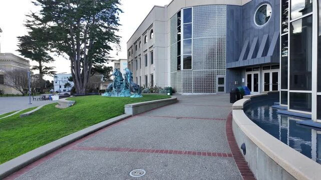 Walking across USF provides an immersive look at campus details, including landscaped terraces, academic buildings, all framed by the rolling terrain of San Francisco