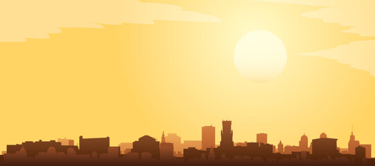 Golden yellow panoramic poster of the city skyline with misty background buildings and clouds of BRUGES, BELGIUM