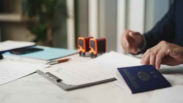 Customs officer approving North Korean person's application, political asylum