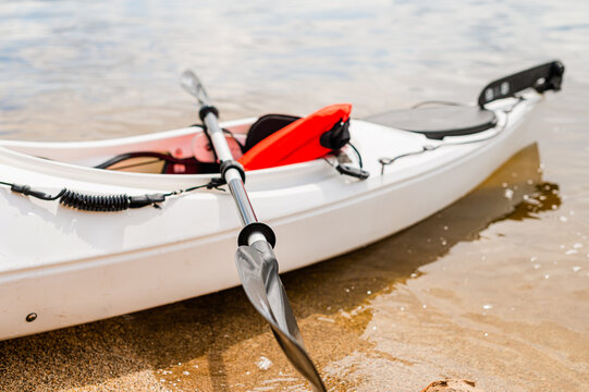 a kayak on the lake shore