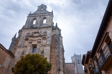 Beautiful facade of the Renaissance-style church of Santo Domingo in the town of Cifuentes, Guadalajara, Castilla-La Mancha, on a cloudy day