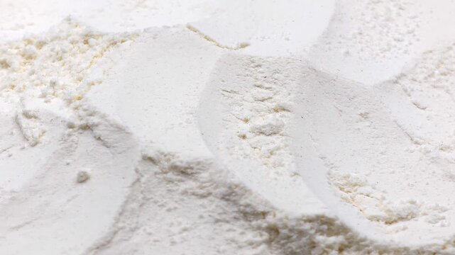 Detailed texture of organic white flour, high-resolution food pattern for milling industry and grocery retail marketing