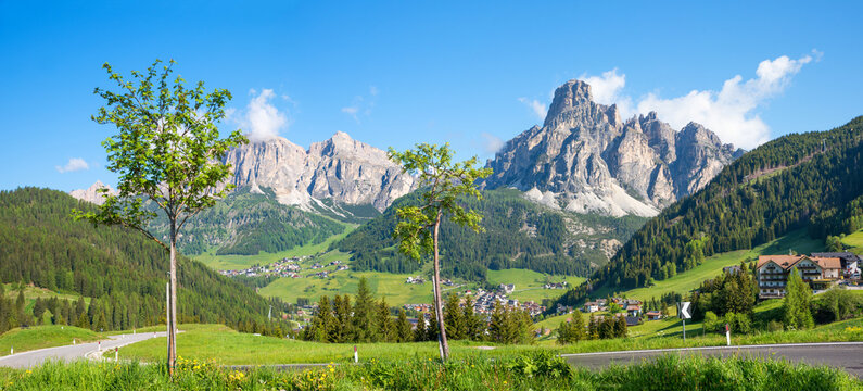 Campolongo pass road with view to Corvara tourist resort, Sassongher mountain, dolomites alps