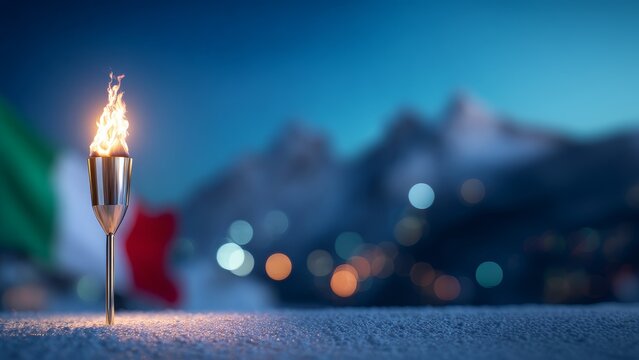 A lit Olimpiada torch stands on snow, symbolizing the Winter Sport Games Сompetitions. The background features blurred mountains and colorful flags.