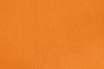 Naklejka premium Orange fabric cloth texture for background, natural textile pattern.