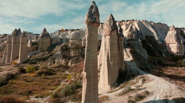 Scenic view of Love Valley in Cappadocia, Turkey, famous for its unique rock formations and fairy chimneys shaped by volcanic activity and erosion.