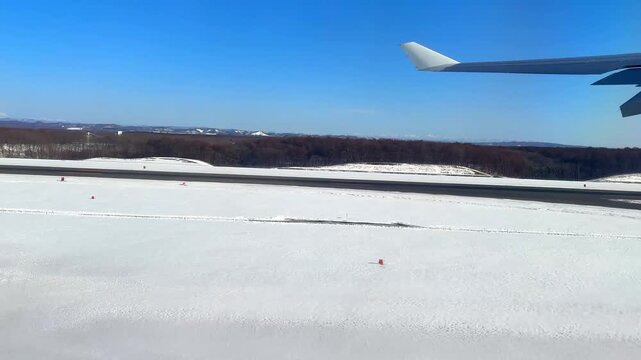 Jet Airplane taking off from New Chitose Airport Hokkaido, Japan
