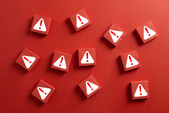 Warning sign,Danger alert, Error notification,Risk management,Important notice message and Emergency caution concept.,Red square cubes with exclamation mark icon over red background.