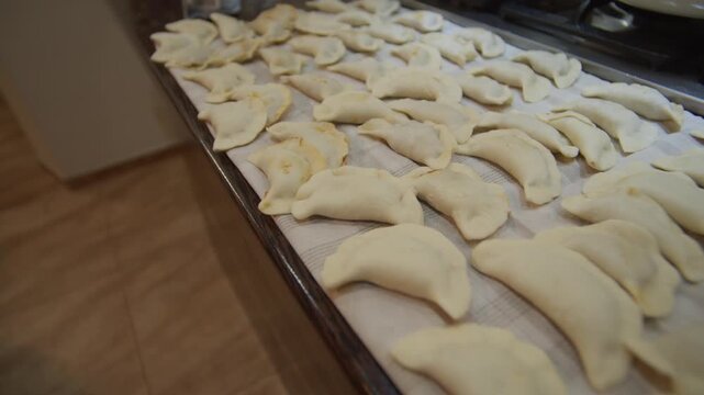 Homemade pierogi preparation using fresh ingredients