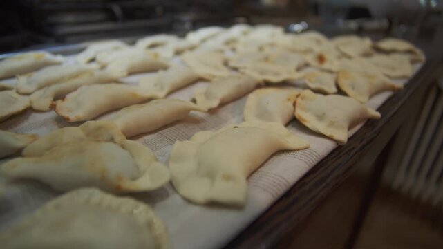 Preparing traditional pierogi dumplings for family meal
