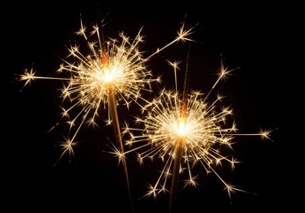 Bright fireworks exploding in night sky celebration golden sparks vibrant display