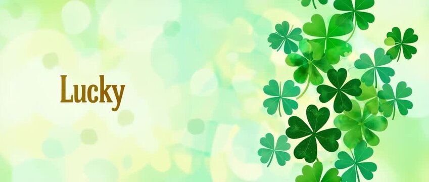 Lucky word on bokeh background with vibrant green four leaf clover border elements