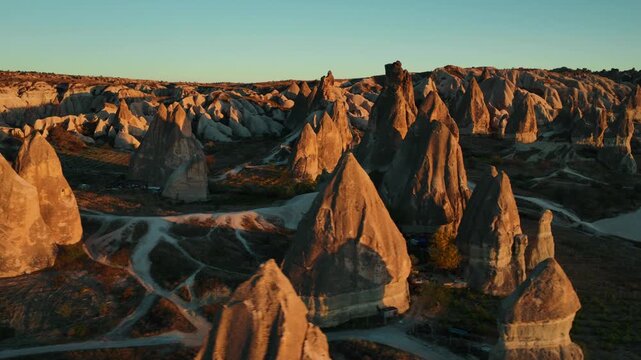 Scenic view of Love Valley in Cappadocia, Turkey, famous for its unique rock formations and fairy chimneys shaped by volcanic activity and erosion.