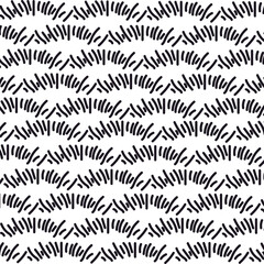 A wavy texture in the form of horizontal rows consisting of short lines.