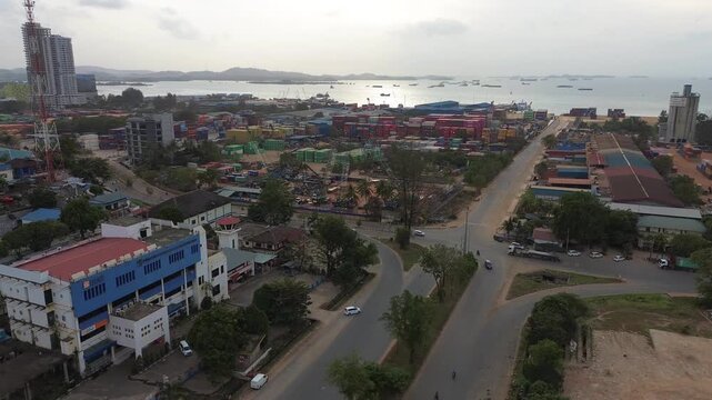 The expansive urban landscape reveals the intricate road network of a bustling port city.