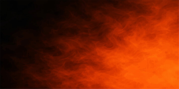 Dramatic burning sunset cloudscape with orange and red flames glowing in the dark night sky creating an abstract nature background of heat and light