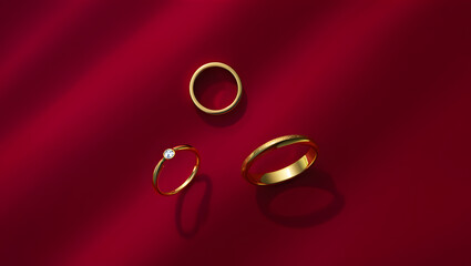 Premium Jewelry Collection: Gold Rings on Red Velvet.