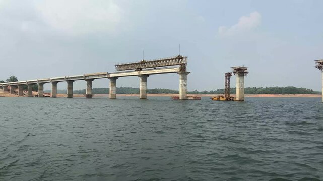 Bridge under construction. Real time, looking back during ferry trip