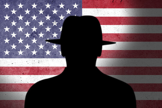 USA spy and hackers launch cyber attacks. Hackers violate privacy. Hacker is searching  personal data. Social media data breaches