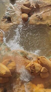 Natural thermal springs and hot pools in Loutra Edipsos, a spa town in Evia island, Greece