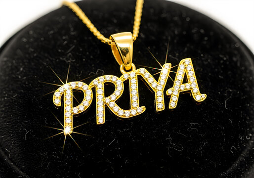 A gold necklace with a diamond-encrusted nameplate pendant on a black velvet display
