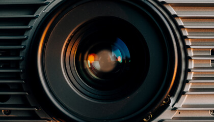 8K Ultra-Realism: Macro shot of a vintage cinema projector head with slow lens rotation and warm glow