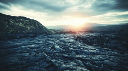 Textured volcanic lava rock landscape with dramatic sky and sunset light