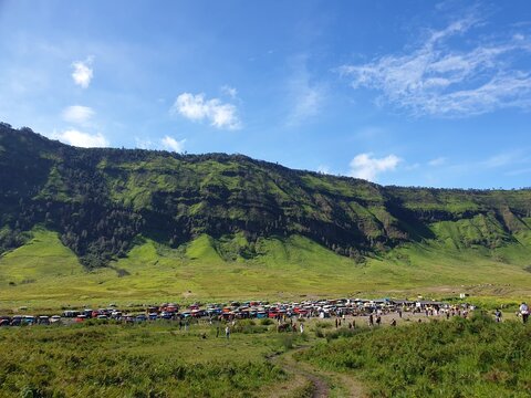 Aerial view of green grass at Bromo Mountain with blurred background. Nature landscape photography at outdoor concept design.