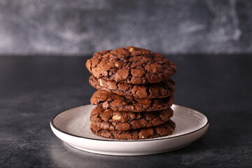 Brownie cookies are on the table. Chocolate chip cookies with nuts. Brownie.
