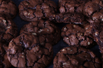 Brownie cookies are on the table. Chocolate chip cookies with nuts. Brownie.