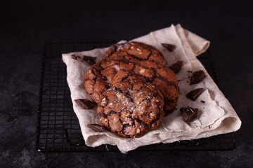 Brownie cookies are on the table. Chocolate chip cookies with nuts. Brownie.