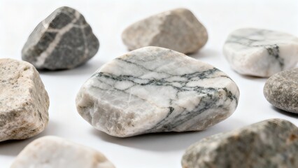 A collection of smooth stones, each with unique patterns and textures. The stones are arranged close to one another