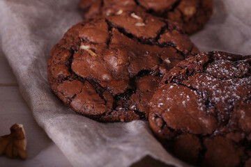 Brownie cookies are on the table. Chocolate chip cookies with nuts. Brownie.