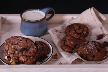 Brownie cookies are on the table. Chocolate chip cookies with nuts. Brownie.
