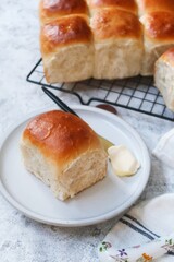 Homemade Indian pav bread or Soft dinner rolls served with butter, selective focus