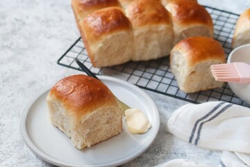 Homemade Indian pav bread or Soft dinner rolls served with butter, selective focus