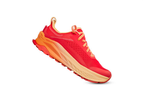 A side view of red and orange trainers, sneakers Isolated on a flat, transparent background.