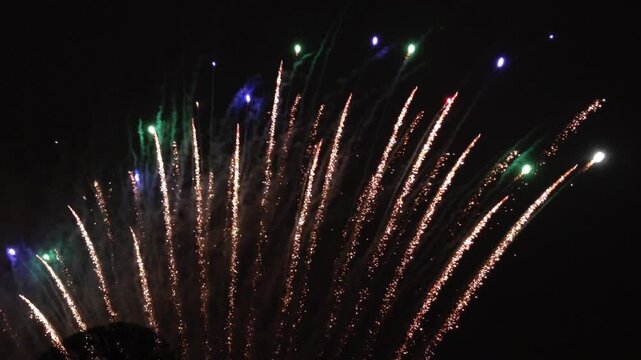 Fireworks explode in the night sky of Saint Petersburg, Russia. Banger. Pyrotechnics bangs. Firecracker explosion