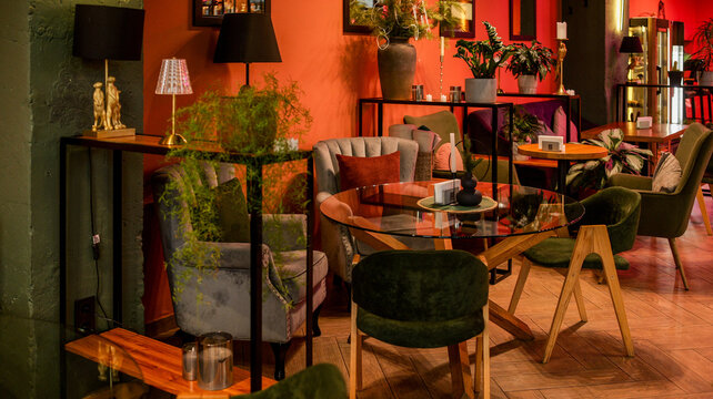 Cozy cafe interior with plush seating and warm ambient lighting