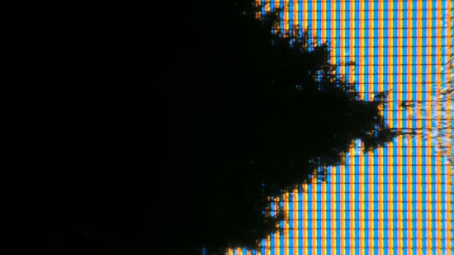 Digital display pixels forming a vibrant grid with a dark organic silhouette on a macro background texture.