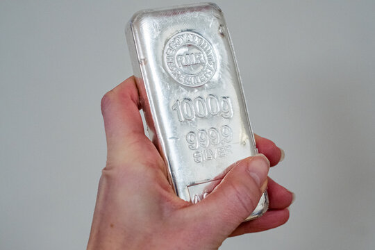 Helsinki, Finland - 28.01.2025: Silver bullion kilo 1000g bar. Silver price record. Precious metal investment. Physical silver.