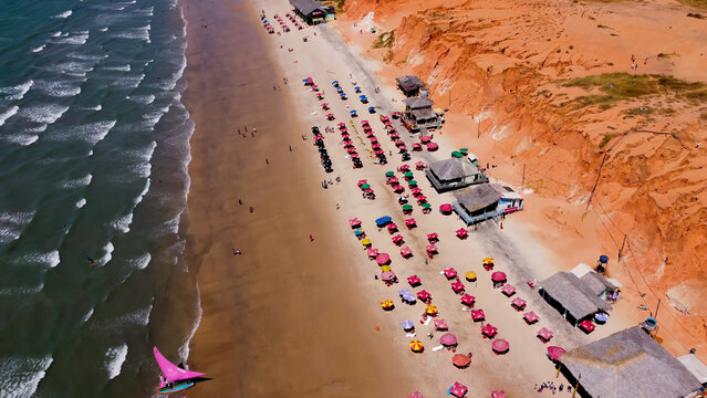 Scenic Beach In Canoa Quebrada Ceara Brazil. Aerial View Of Stunning Beach With Crystal Clear Waters. Paradise Landscape Idyllic Beauty. Summertime Idyllic Coast. Canoa Quebrada Ceara.